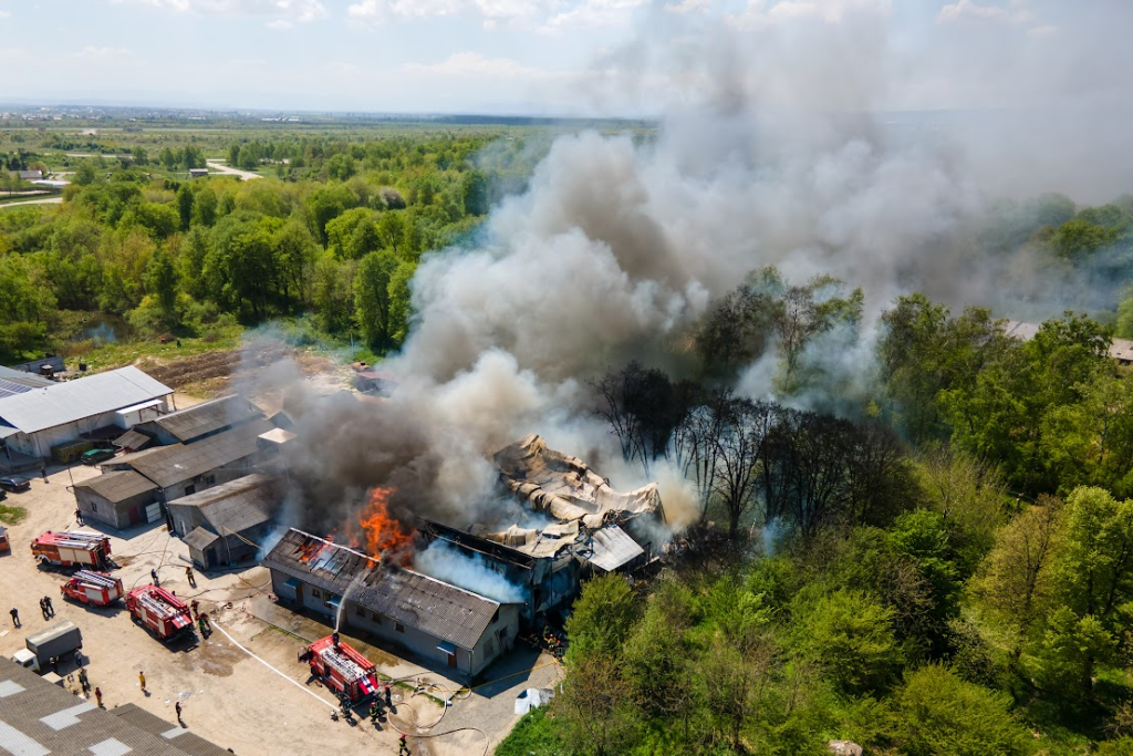 Aerial view of a house on fire.